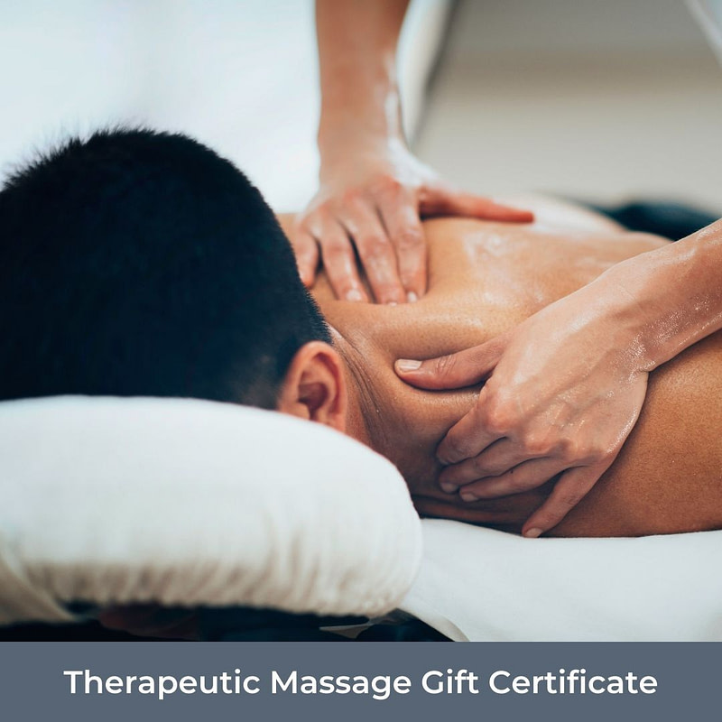 Massage therapist massaging neck and shoulders