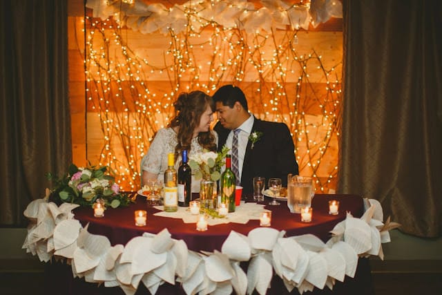 A decorated sweetheart table at a wedding
